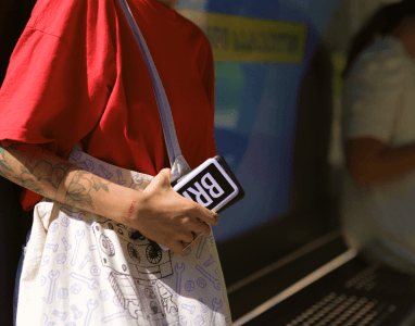 Girl holding a Brick powerbank